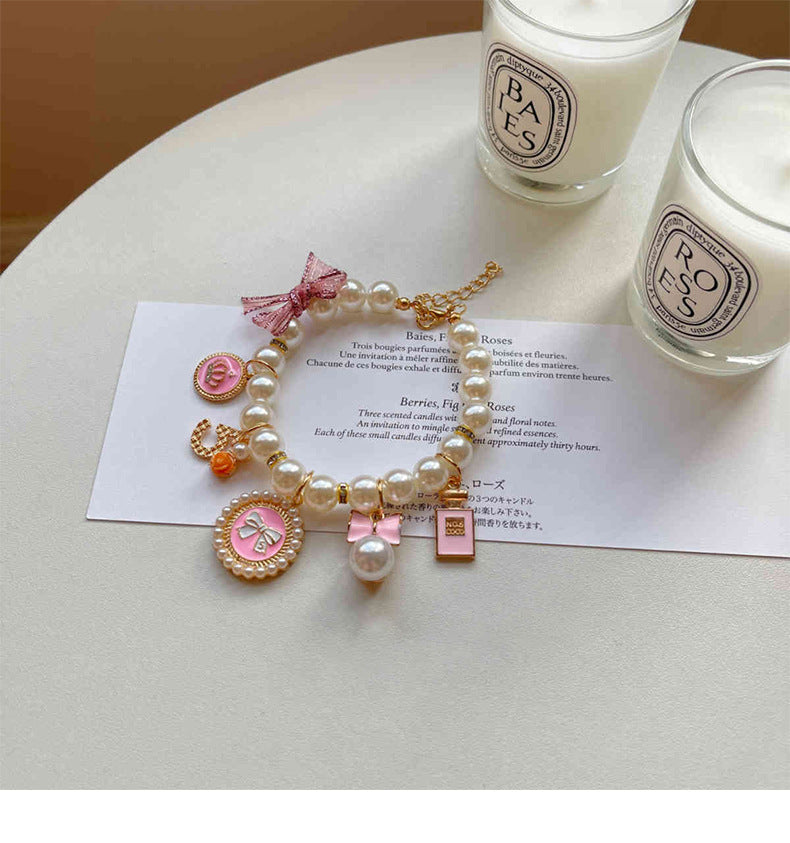 Pink 4-PCS Pearl Charm Pet Necklace - Adjustable Bowknot Collar for Small Dogs & Cats (M: 25+5CM)